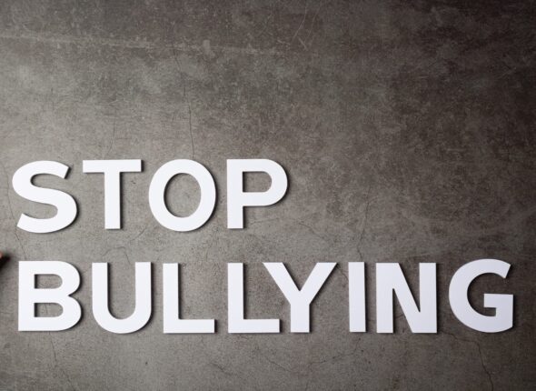 Image showing the words ‘Stop Bullying’ in white text on a gray background