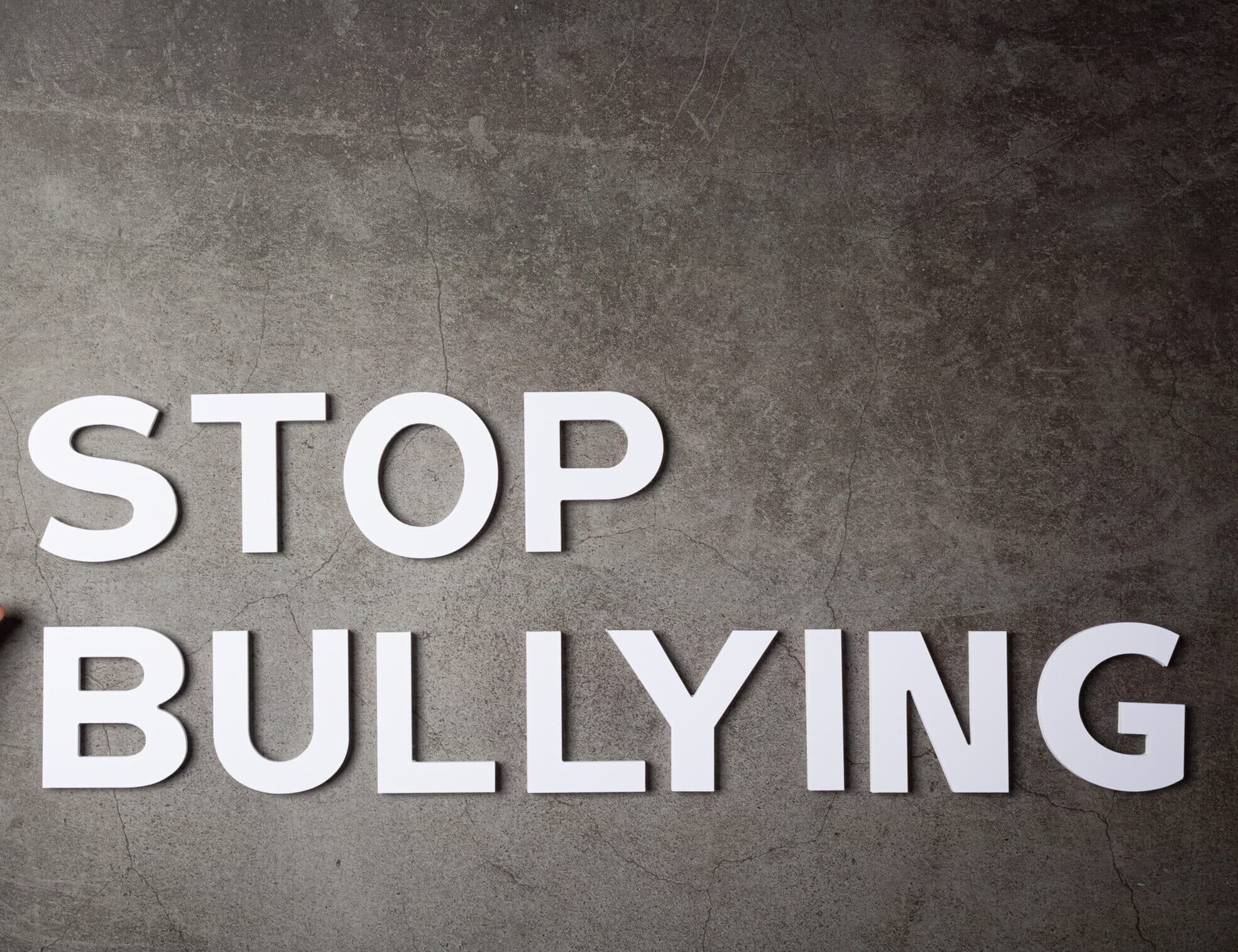 Image showing the words ‘Stop Bullying’ in white text on a gray background
